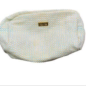 Tarte woven fabric makeup cosmetic bag in light green gold branded zip tag